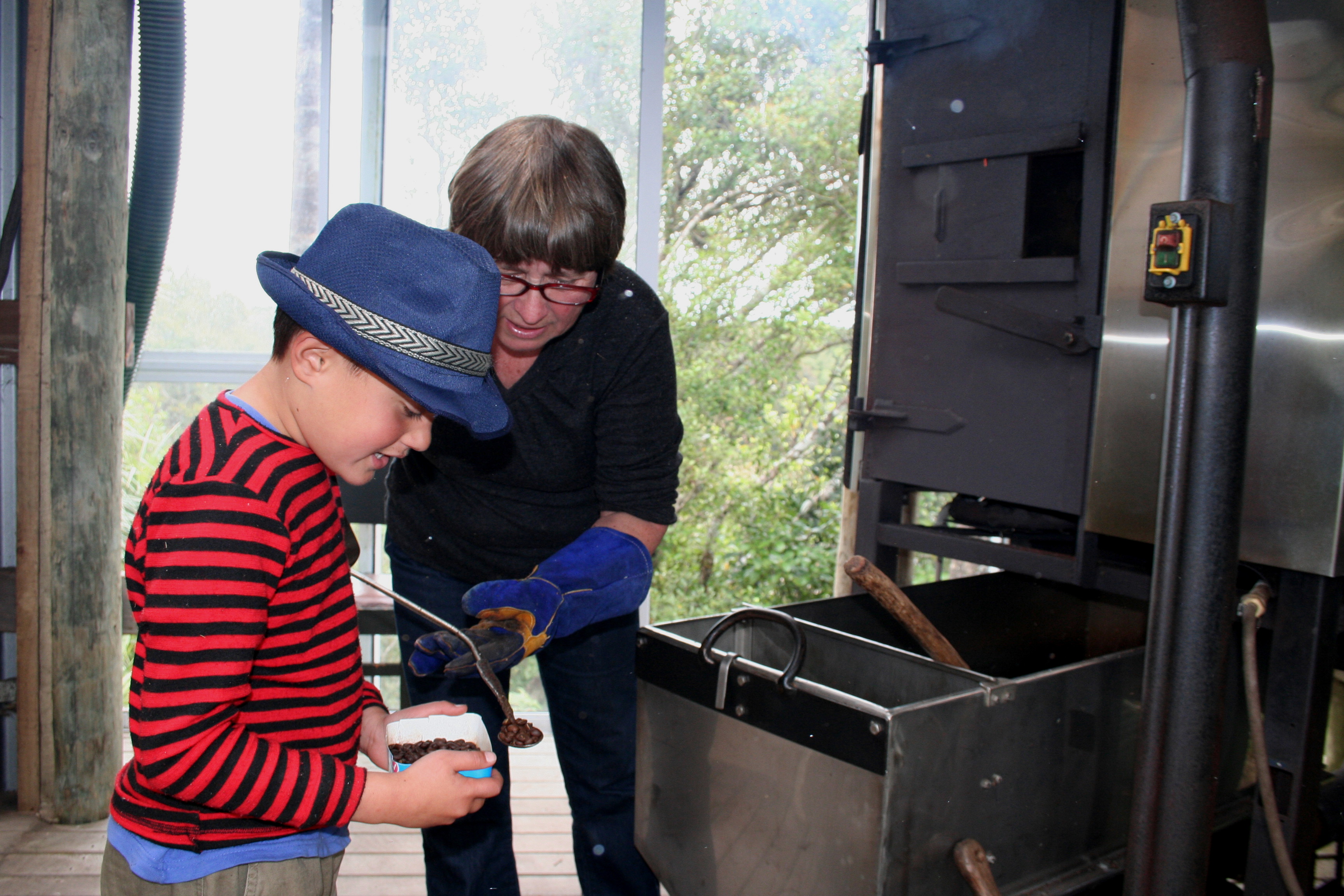 Tater Coppernoll and Connor Heke compare coffee beans at Kawatiri Roasters