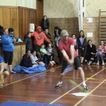 Charlie Smith smacks the ball into the floor to avoid being caught out.