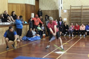 Charlie Smith smacks the ball into the floor to avoid being caught out.