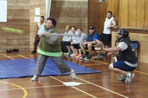 Fay Mulligan swings fast as the catcher waits.